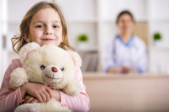 Girl with Teddy Bear